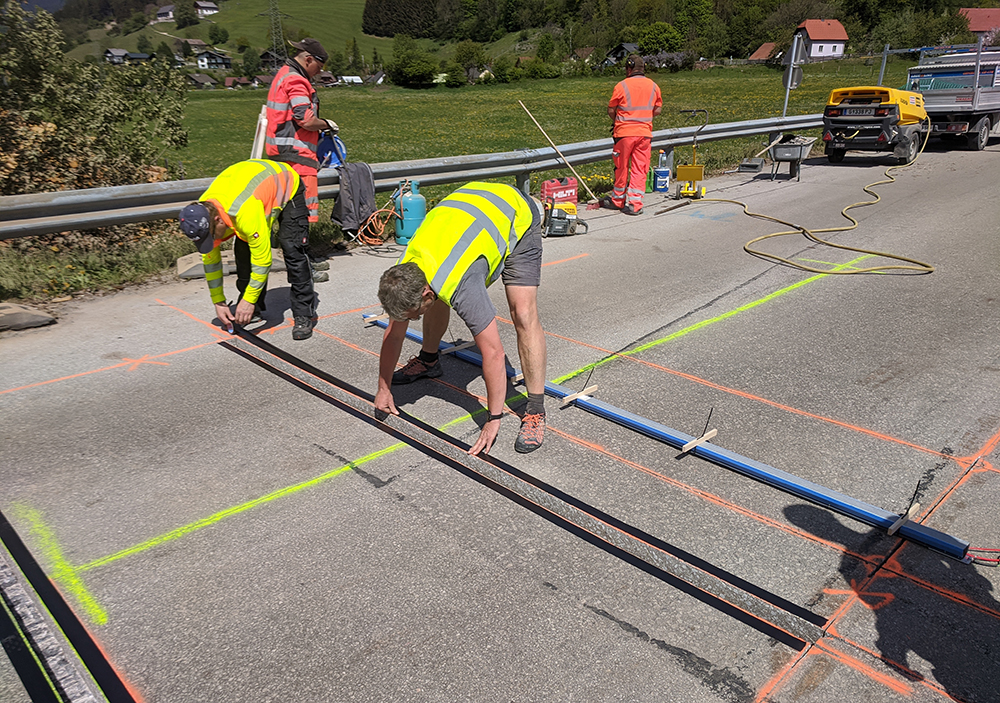 Bridge monitoring by Revotec on behalf of Austrian Federal Railways: installing two rows of Lineas sensors for KiTraffic Statistics (image courtesy Kistler Group)