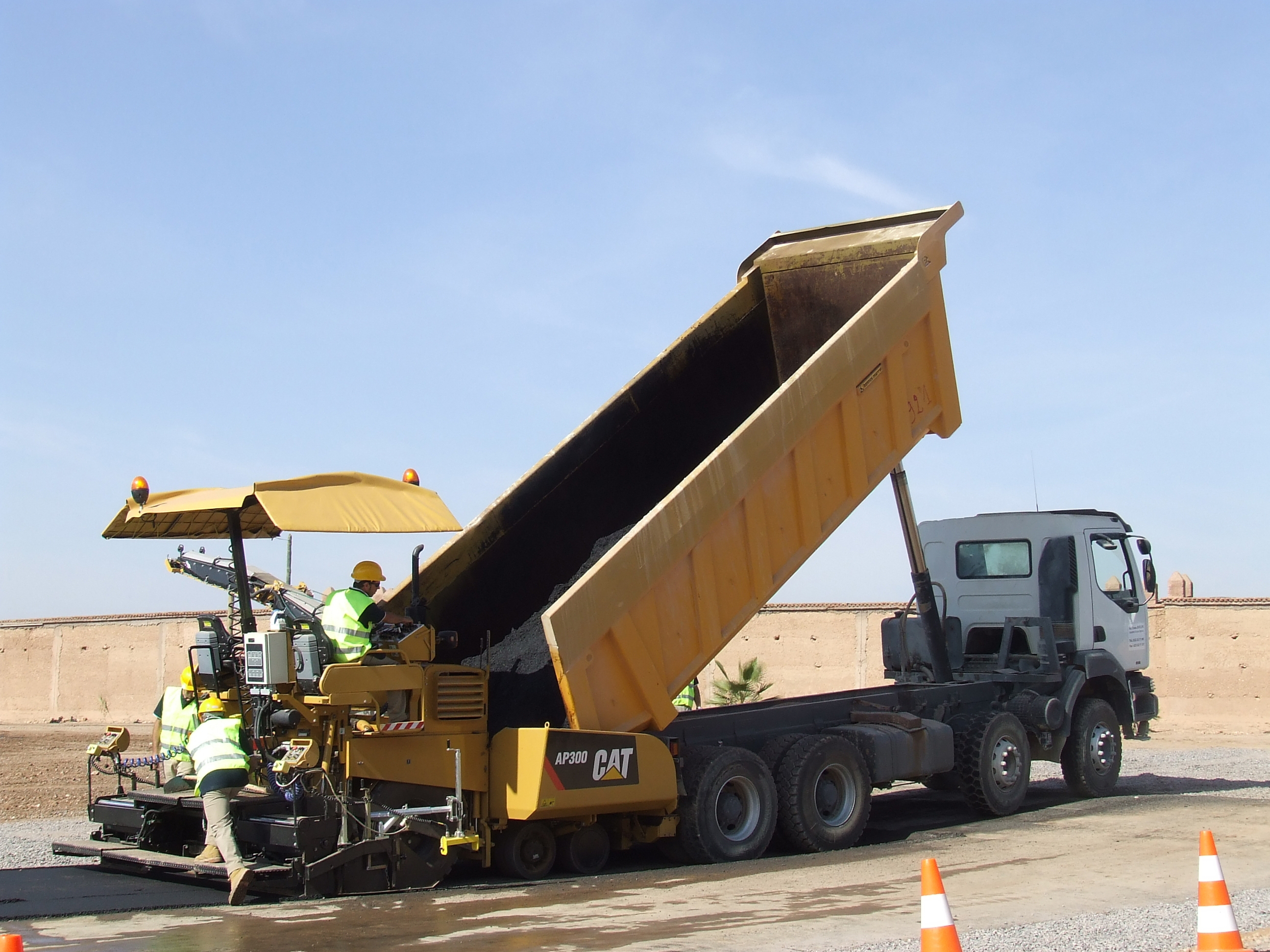 Cat AP300 paver being loaded