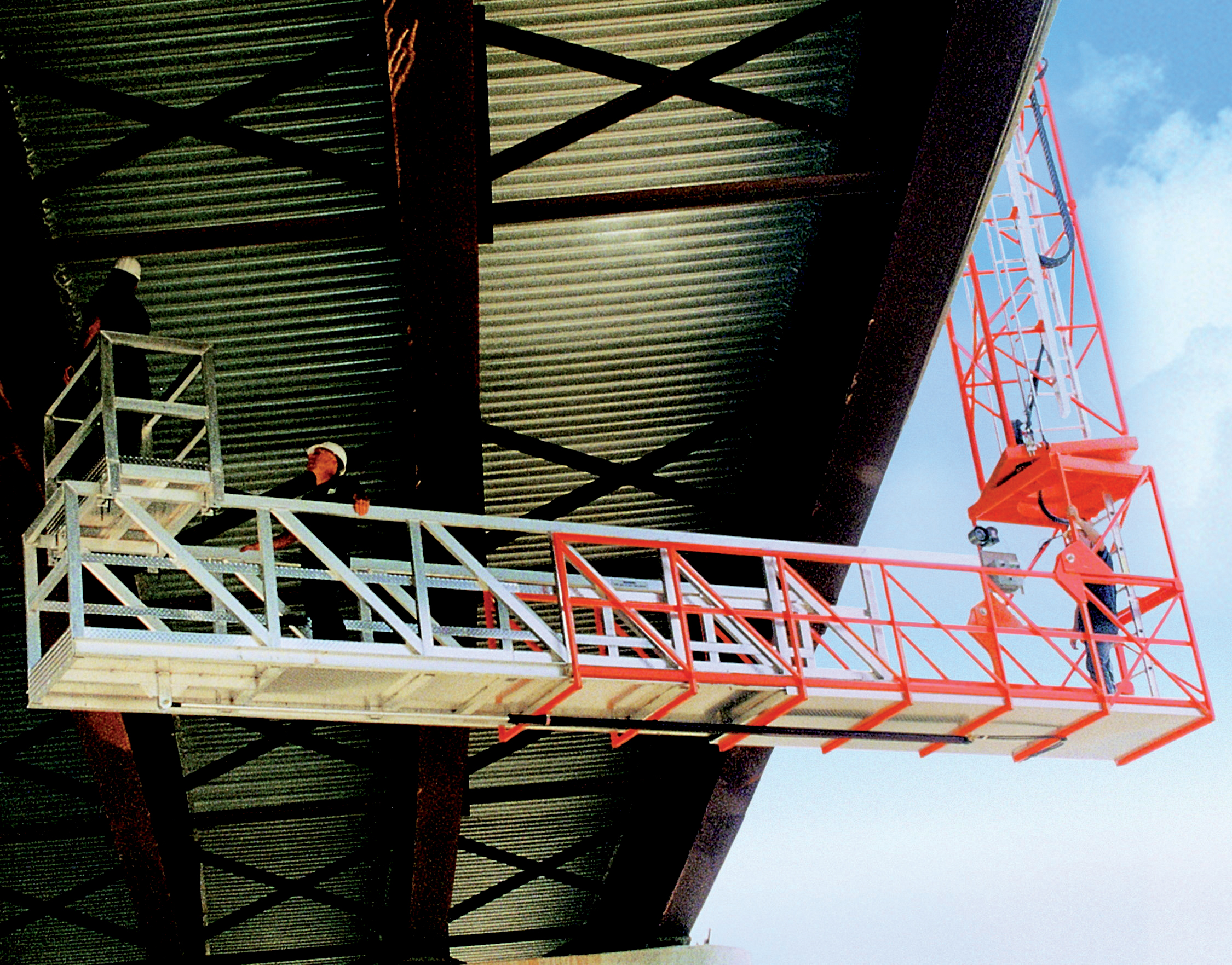 Man on platform under bridge