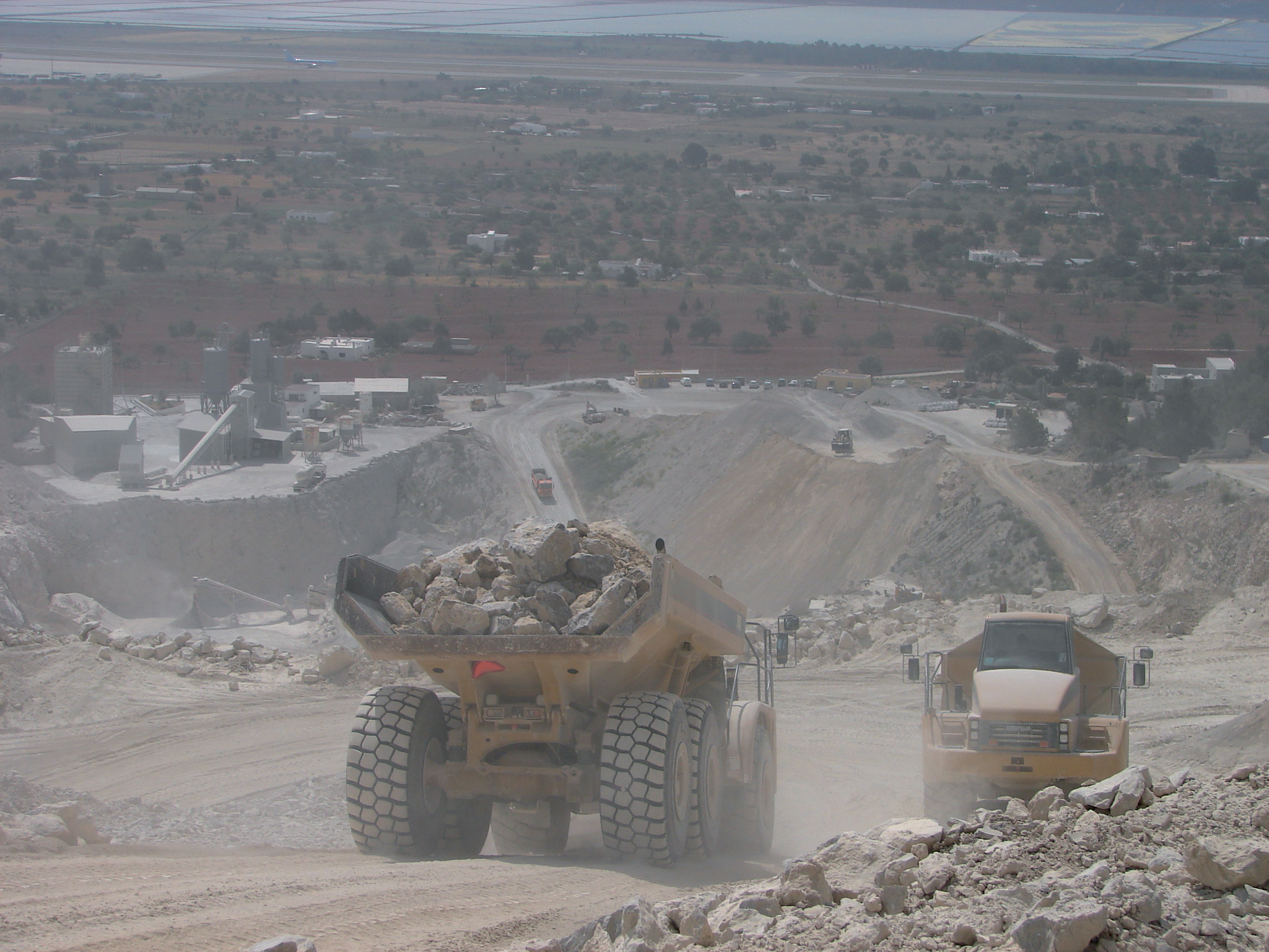 Dump trucks transporting rumbling 