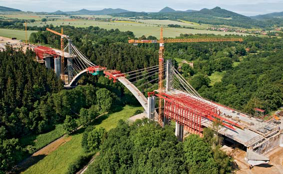 arched bridge crosses the Oparno Valley