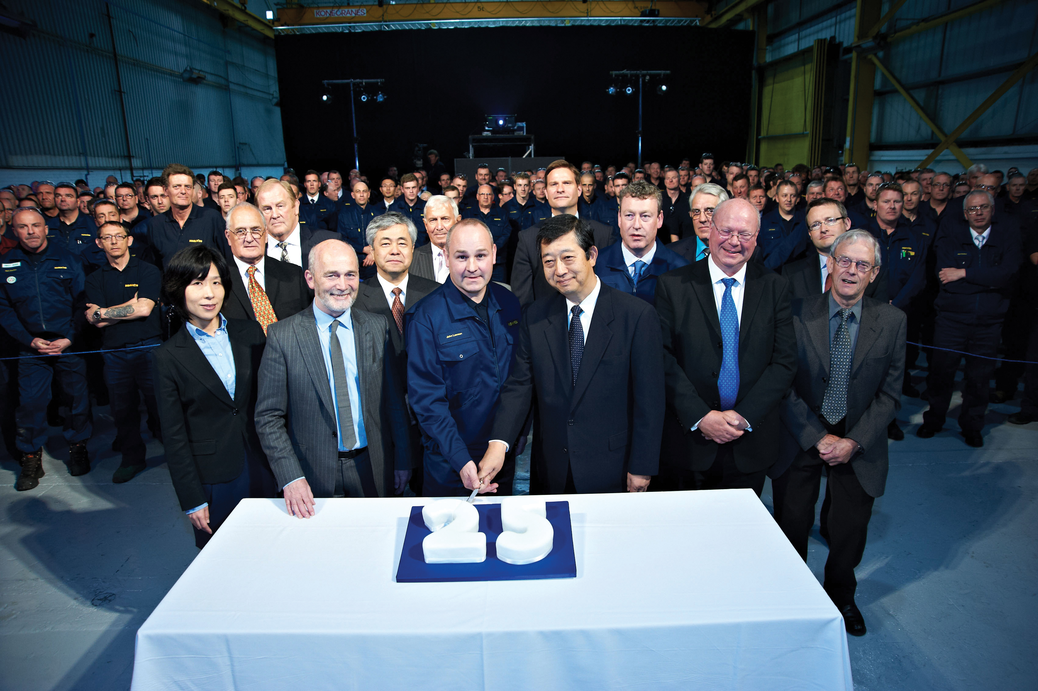 Komatsu cake cutting for 25th anniversary