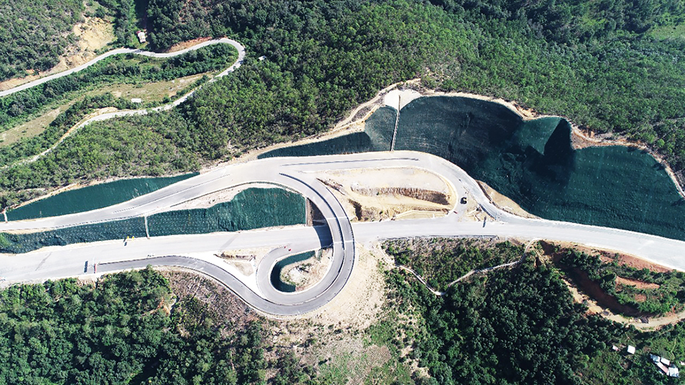 The challenging terrain has meant the road builders have had to make extensive cuttings for the roadway