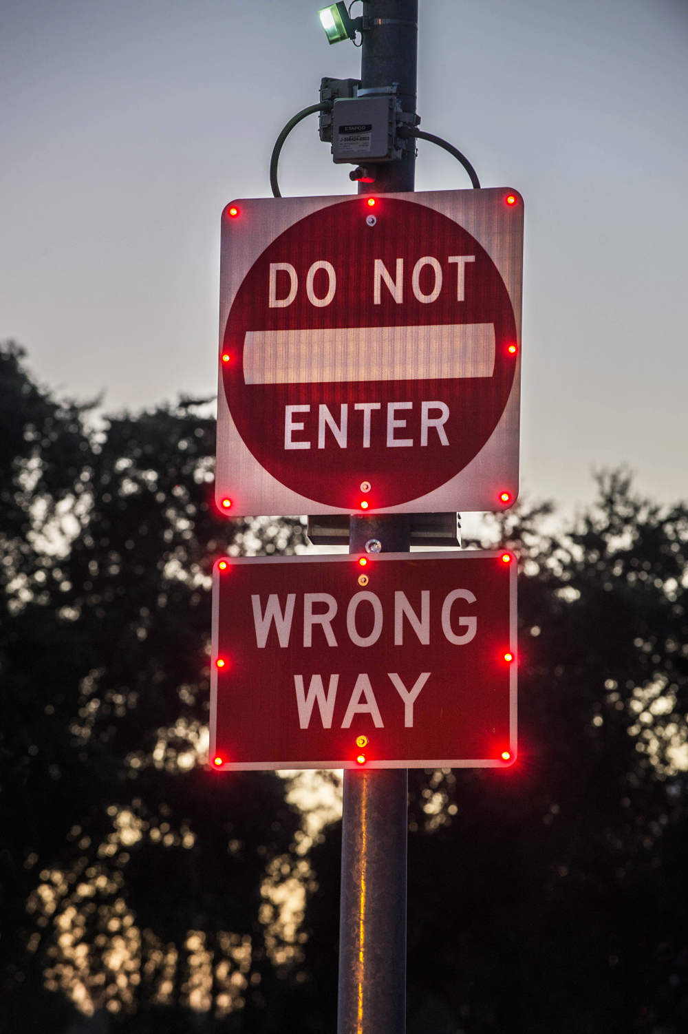 Wrong-way signs with 24-hour flashing LED lights warn drivers not to enter the exit ramp (photo courtesy CALTRANS)