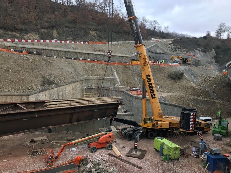 Sections for the Calvario Bridge on the SR318 widening project have been lifted in using a large mobile crane