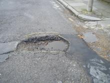 pothole on a road 