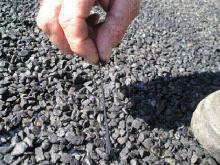 man testing minerals