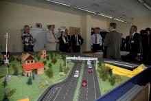 delegates with model road