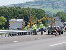 Aximum vehicle restraint systems being installed