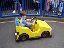 Child in Lego Car