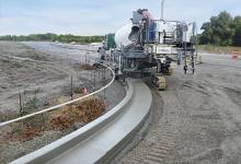 Wirtgen's new SP15 pouring curved barrier