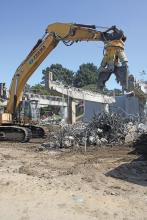 Hydraulic demolition shears at work at Presidio Parkway 