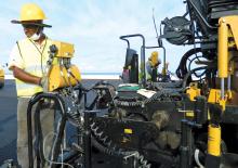 Caterpillar paver was used to place three layers of asphalt 