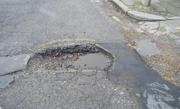 pothole on a road 