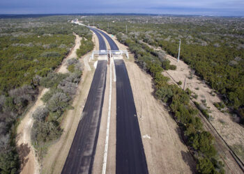 Modern tolling systems and VMS technology are installed on the gantries over the route