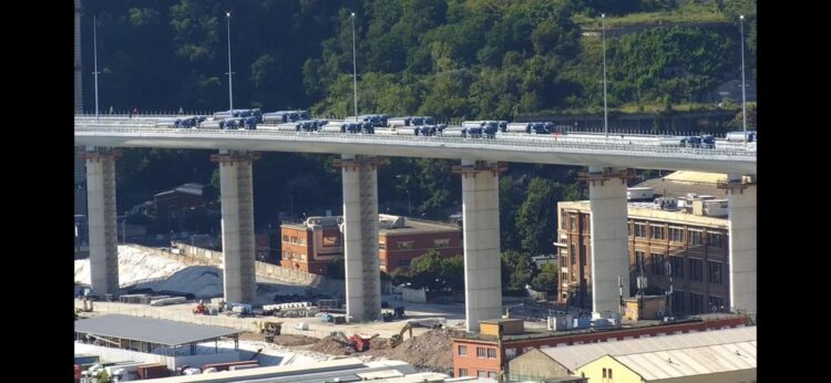 Trucks drive across the San Giorgio Bridge in Italy as part of load testing before the structure opens (photo courtesy Webuild)