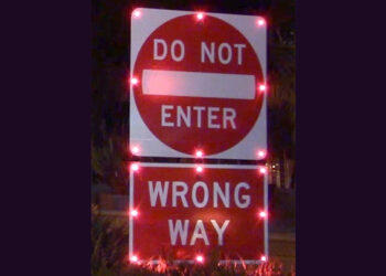 Wrong-way signs with 24-hour flashing LED lights warn drivers not to enter the exit ramp