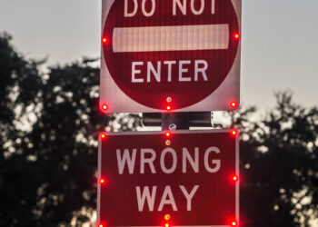 Wrong-way signs with 24-hour flashing LED lights warn drivers not to enter the exit ramp (photo courtesy CALTRANS)
