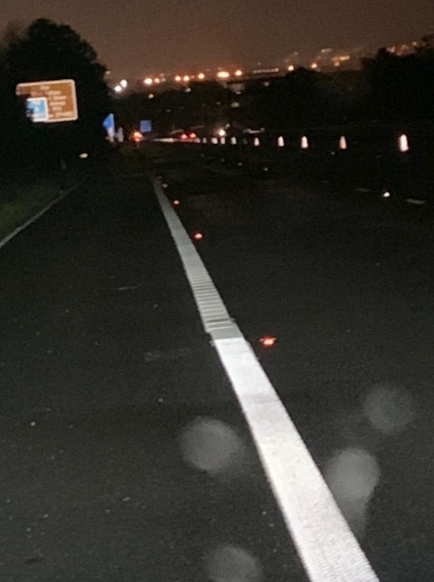 The white line towards the top of the picture shows a standard road marking, while in the foreground is one of the alternatives being tested