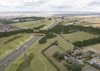 The proposed Thong Lane green bridge linking the towns of Gravesend and Thong and the approach to the southern tunnel entrance, looking north (artist image courtesy Highways England)