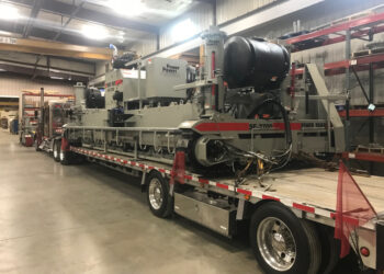 The road surfacing portion of the tunnel contract was carried out using an SF-2700 slipformer from Power Pavers