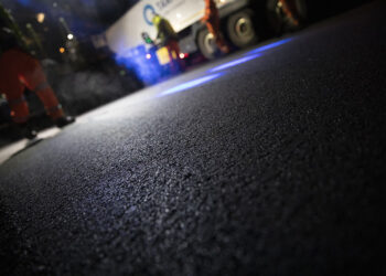 A special asphalt grade has been used to overlay deteriorating concrete on the A11 in the UK