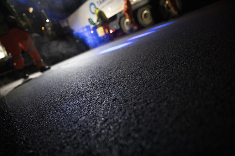 A special asphalt grade has been used to overlay deteriorating concrete on the A11 in the UK