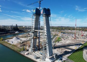 Temporary struts are connecting and supporting both pairs of towers as they continue to climb on opposite banks of the Detroit River, which is the border between Detroit in the US and the Canadian city of Windsor (image courtesy Windsor-Detroit Bridge Authority)