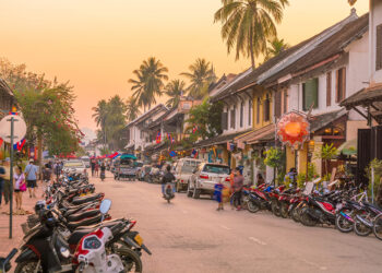 Small capacity motorcycles and scooters are predominant for urban personal transport in Lao PDR, as in many Southeast Asian nations © F11photo | Dreamstime.com