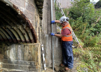 Installation of an OTT ecoLog 1000 water level logger in a stilling well with cellular data connection to Hydromet Cloud for the Vales Burn bridge trial in Scotland (image courtesy OTT HydroMet/Transport Scotland)