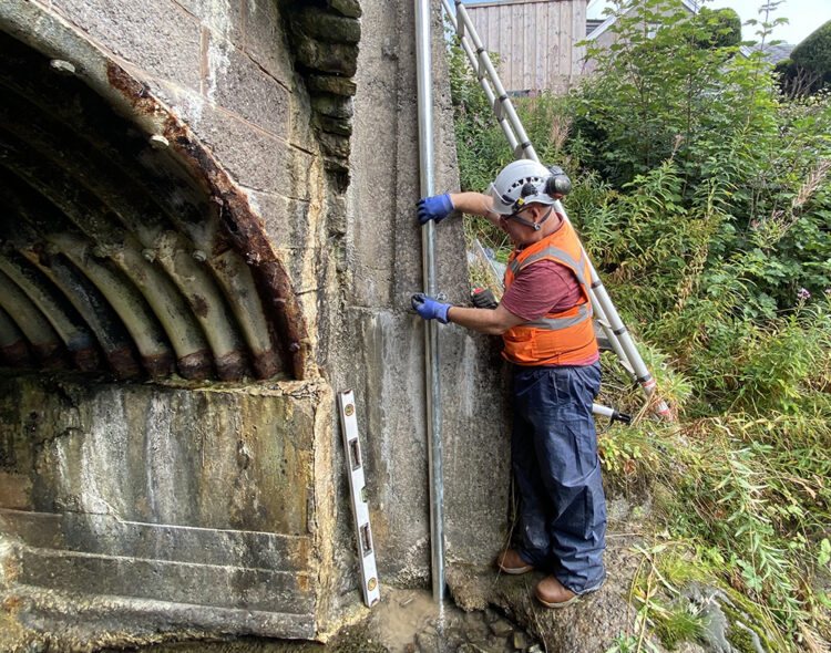 Installation of an OTT ecoLog 1000 water level logger in a stilling well with cellular data connection to Hydromet Cloud for the Vales Burn bridge trial in Scotland