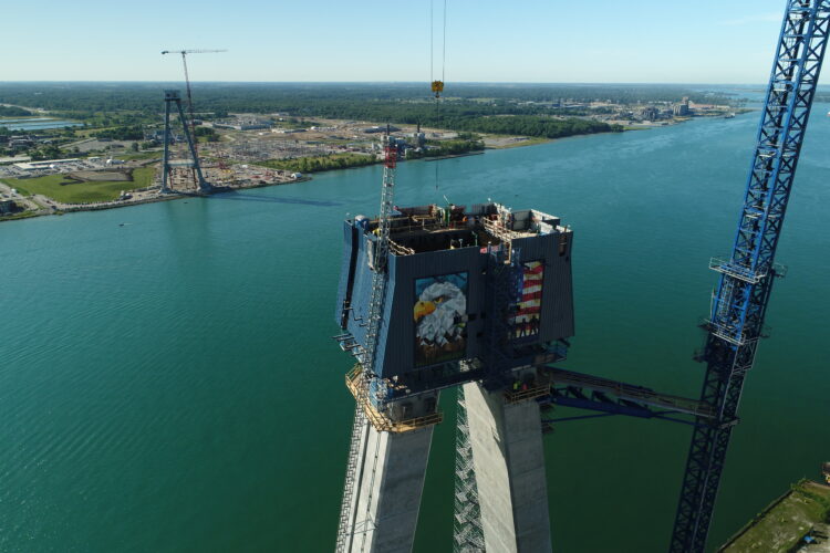 Tower on the US side of the Detroit River, looking over the Canadian tower in Windsor, Ontario – July 2022 (image courtesy Windsor-Detroit Bridge Authority)