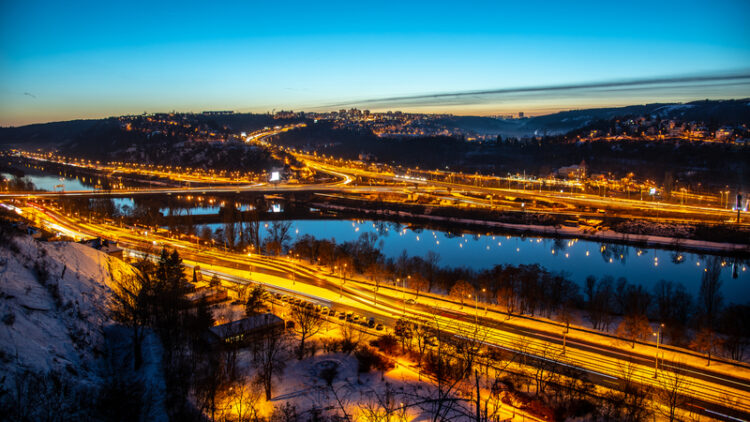 Lighting up time in Prague: view of the Barrandov Bridge over the Vltava River on a winter evening (image © Pytyczech/Dreamstime)