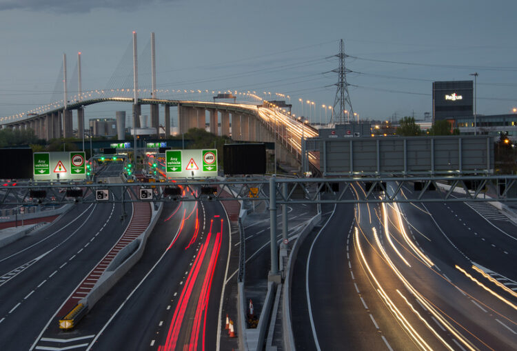 Part of England’s Strategic Road Network is the Dartford River Crossing near London that includes the Queen Elizabeth Bridge over the Thames River as well as a parallel tunnel under the water (image © Chris Moncrieff/Dreamstime)