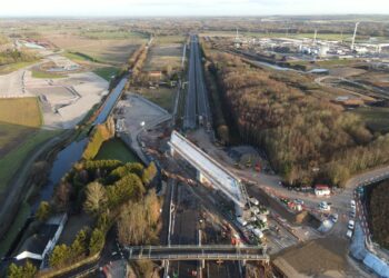 Over the past six months, the 86m-long concrete structure was built on land next to the motorway and then slid across the road in a two-day operation (image courtesy of High Speed Two Ltd)