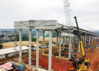 The deck for the viaduct sections sits on precast beams raised into position