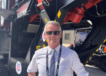 Erwin Schneller, SBM Mineral Processing managing director, in front of the JAWMAX 400 jaw crusher