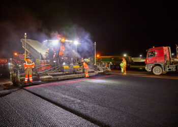 The asphalt pavers use one or two Trimble MT900 Machine Targets depending on their position in the paver setup and are guided in 3D by the Trimble PCS900 Paving Control System and Trimble SPS930 Universal Total Stations -Photo La Compagnie Générale de Photographie