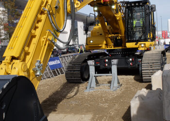 Komatsu's versatile, high-reach demolition machine allows users to change booms quickly