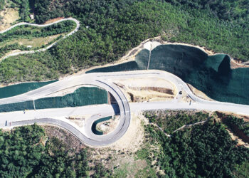 The challenging terrain has meant the road builders have had to make extensive cuttings for the roadway