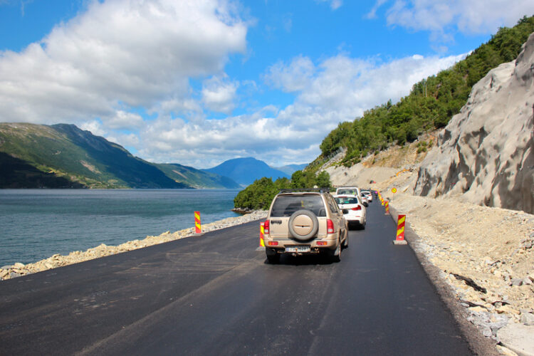 Better but safer? New asphalt on a coastal road near Ullensvang, Norway (image © Andrii Zhezhera/Dreamstime)
