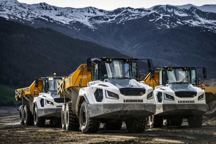 A fleet of Liebherr TA230 ADTs is carrying out earthmoving work for a road project in Northern Italy