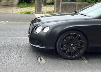 The UK has a serious pothole problem that causes traffic delays and vehicle damage - image © courtesy of Mike Woof
