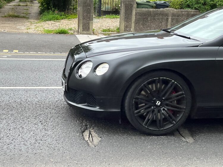 The UK has a serious pothole problem that causes traffic delays and vehicle damage - image © courtesy of Mike Woof