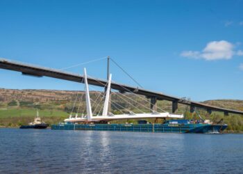 The furstr half of 184m-long cable-stayed twin-leaf bridge passing under the Erskine Bidge in Scotland (image courtesy Graham Construction/Renfrew Council)
