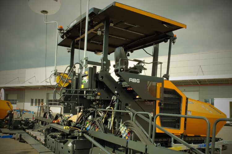 A tamper bar type paver from Ammann will be used for RCC paving in the US