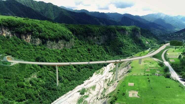 A rendering of the 426m long and 166m high arched bridge that is part of the Kvesheti-Kobi scheme in Georgia. Image: https://kveshetikobiroad.ge