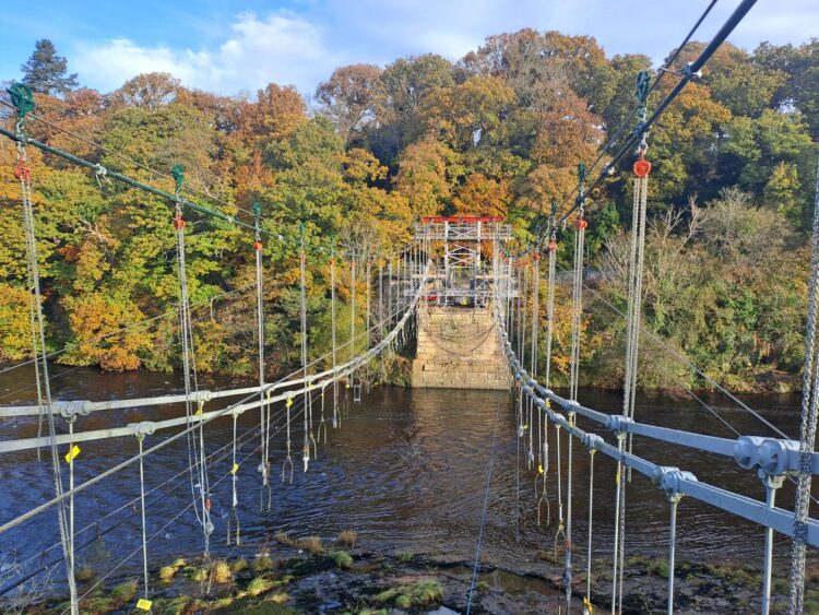 Whorlton Bridge - one of the UK’s oldest road suspension bridges and with a timber deck supported by original iron chains – had to be completely dismantled and all components inspected, shotblasted, tested and repainted (image courtesy Maybe Hire)