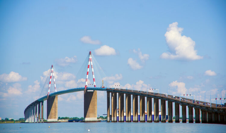 The cable-stayed bridge - with a 404m-long central span - rises over the River Loire and links Saint-Nazaire on the north bank and Saint-Brevin-les-Pins on the south bank (image © Inglebert Valery/Dreamstime)