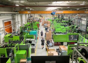 Neutal's injection moulding machine hall, where numerous different polycarbonate components are produced